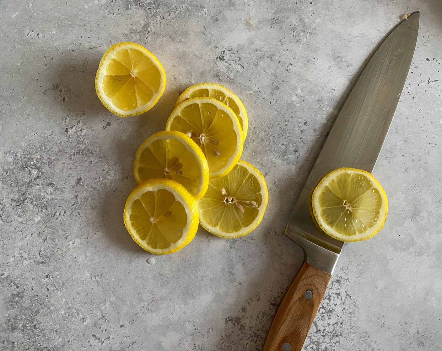 step 3 Juice and zest 2 of the Lemons (3). Chop the Garlic (3 cloves), and Italian Flat-Leaf Parsley (1 handful). Thinly slice the third lemon.