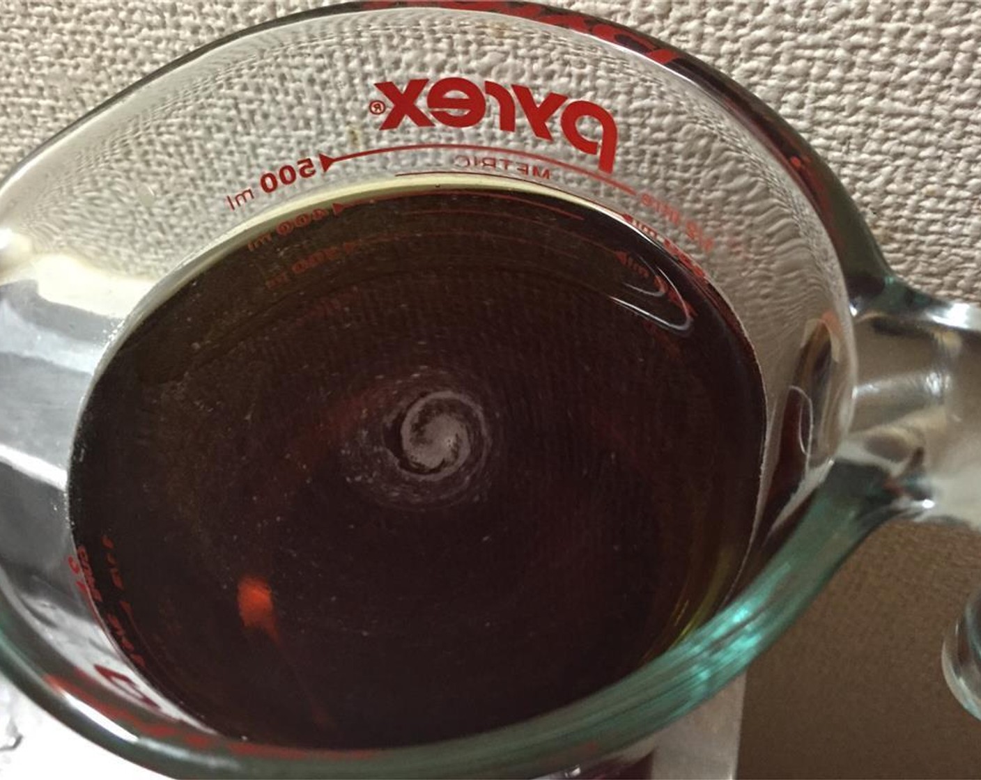 step 5 In a cup or bowl, mix the Water (2/3 cup) and the three remaining tablespoons of sugar and soy sauce.