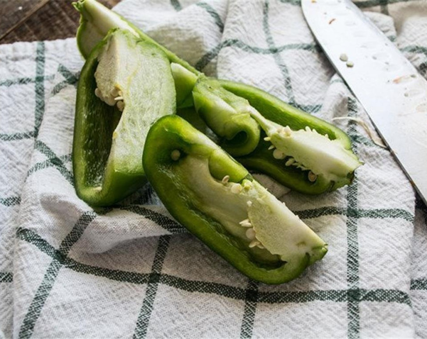 step 5 Add Green Bell Pepper (1) and Fresh Ginger (1 tsp) continue cooking for another 2 to 3 minutes until onions and garlic begin to golden.