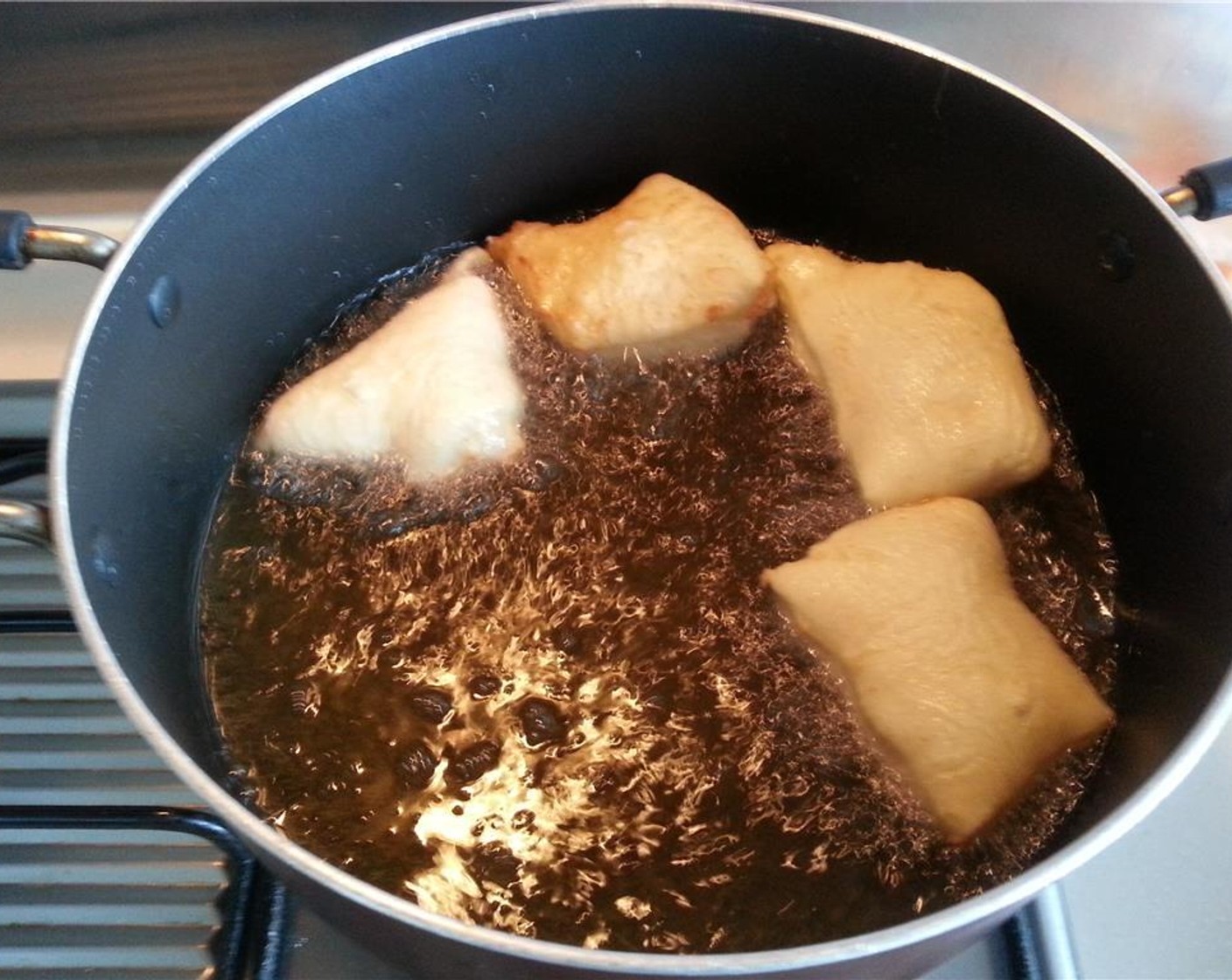 step 9 Deep-fry, flipping constantly, until they become a nice golden color.