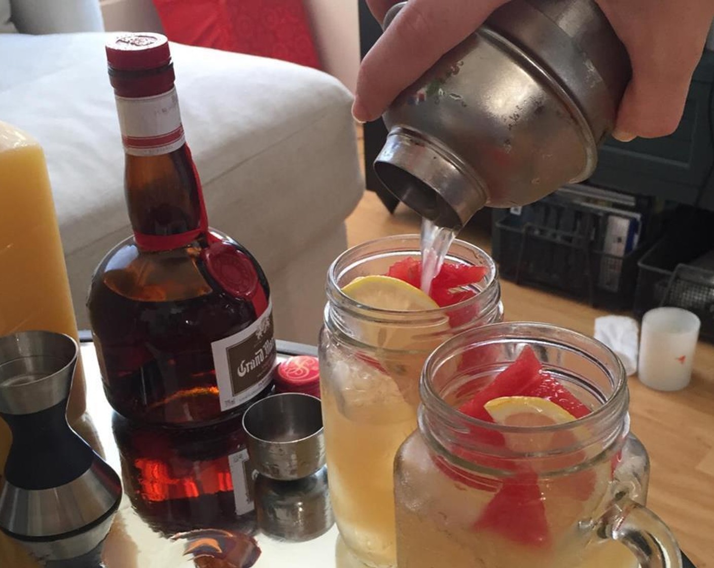 step 2 Strain into a chilled glass with Ice (as needed), chopped Watermelons (to taste), and a lemon wedge.