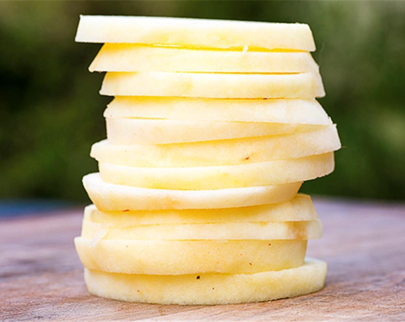 step 5 Peel, core and cut the Apples (2) into quarter-inch rings.