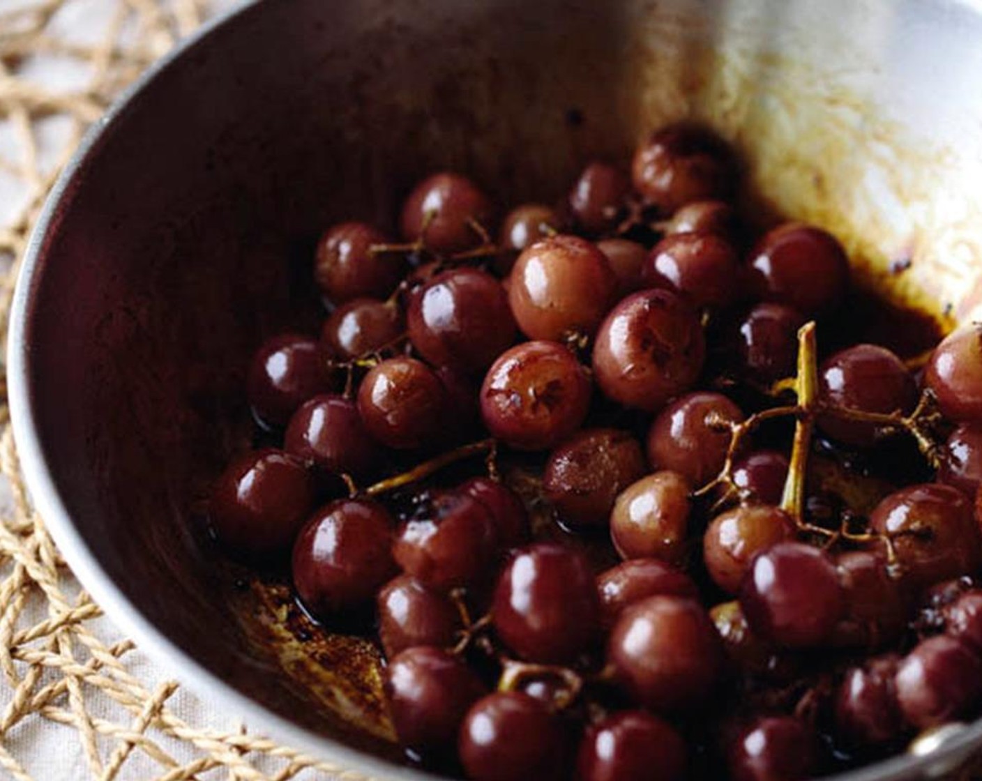 step 10 Cook while turning the grapes every so often, until they start bursting, 8 to 10 minutes.