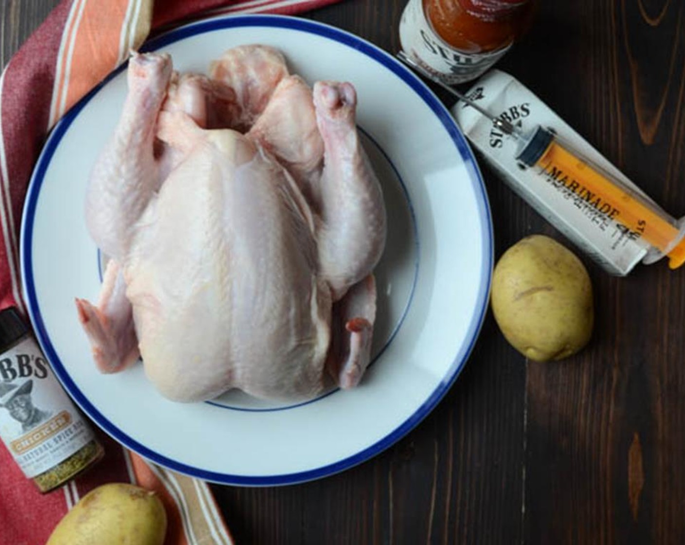 step 1 We will be using an indirect cooking method for the chicken, which means if you're using a gas grill, only one of the burners will be on and the others will not. The wood chips will be set directly on the lit burners and the chicken will sit on the opposite side of the grill.