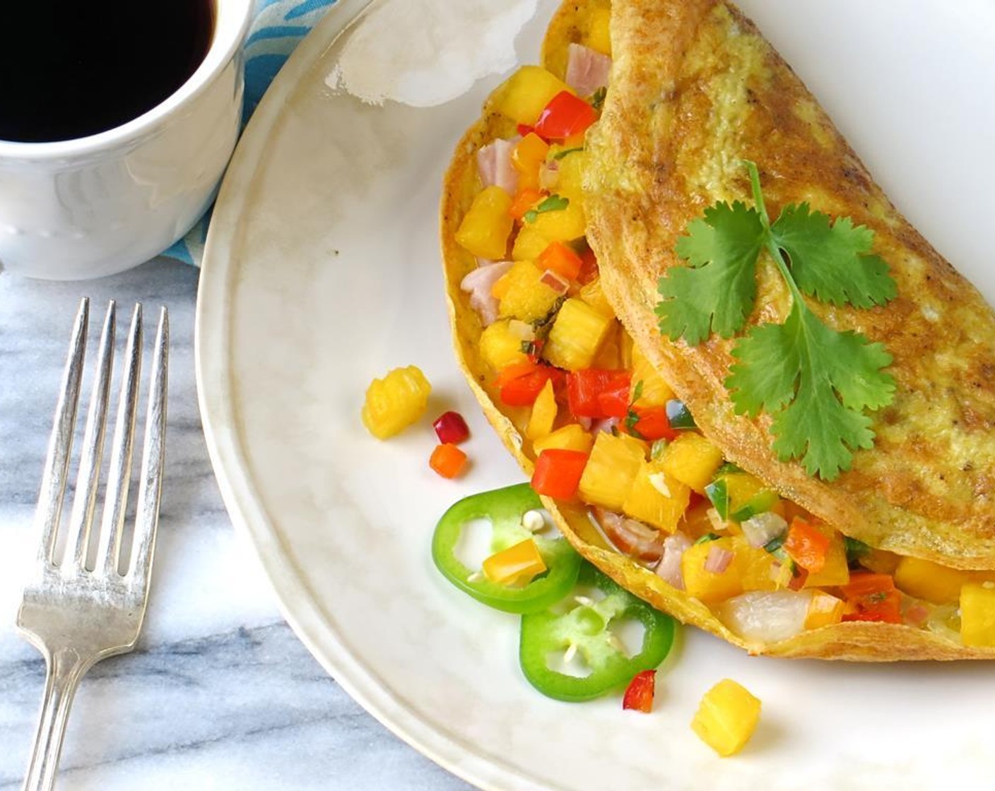 step 10 Remove from heat and slide the omelet onto a plate. Serve.