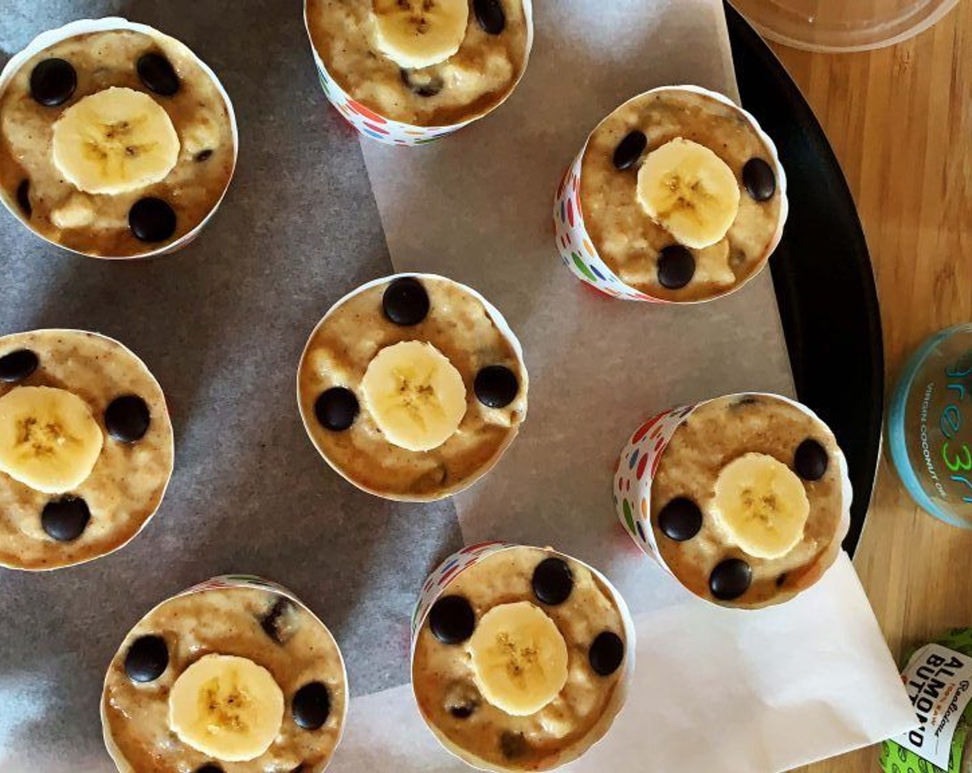 step 5 Fill 2/3 of the muffin cups with the batter. Add on top a slice of fresh banana if you fancy