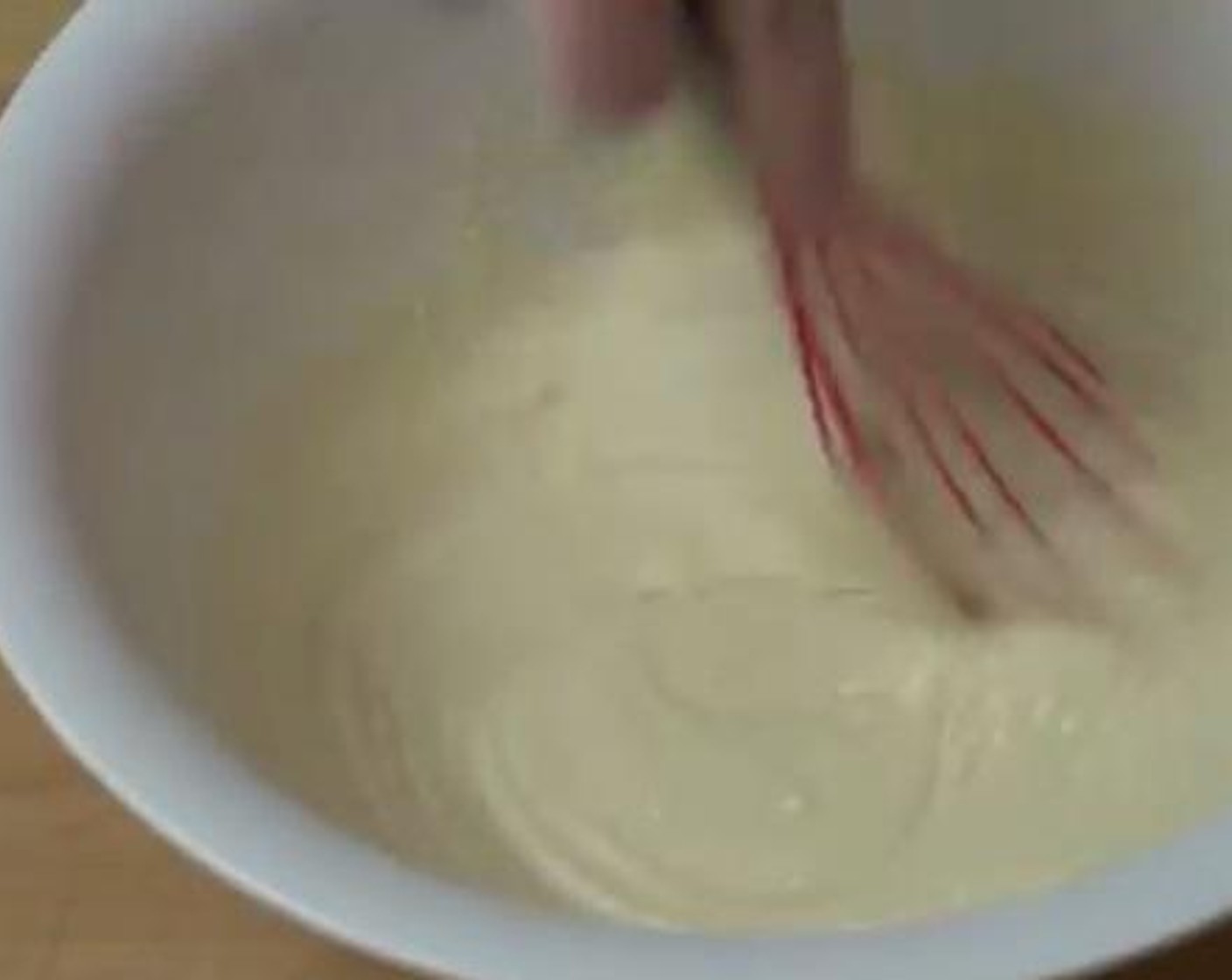 step 3 Add the wet ingredients into the dry ingredients until a nice and smooth dough forms.