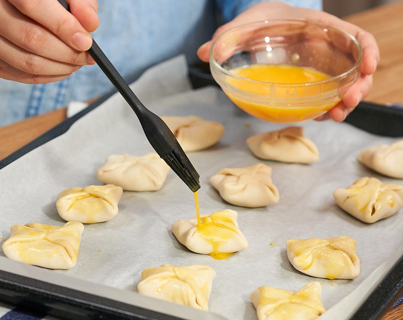 step 7 Brush all sides of the pastry with Egg (1). Bake for 10-15 minutes or until puffed and golden.