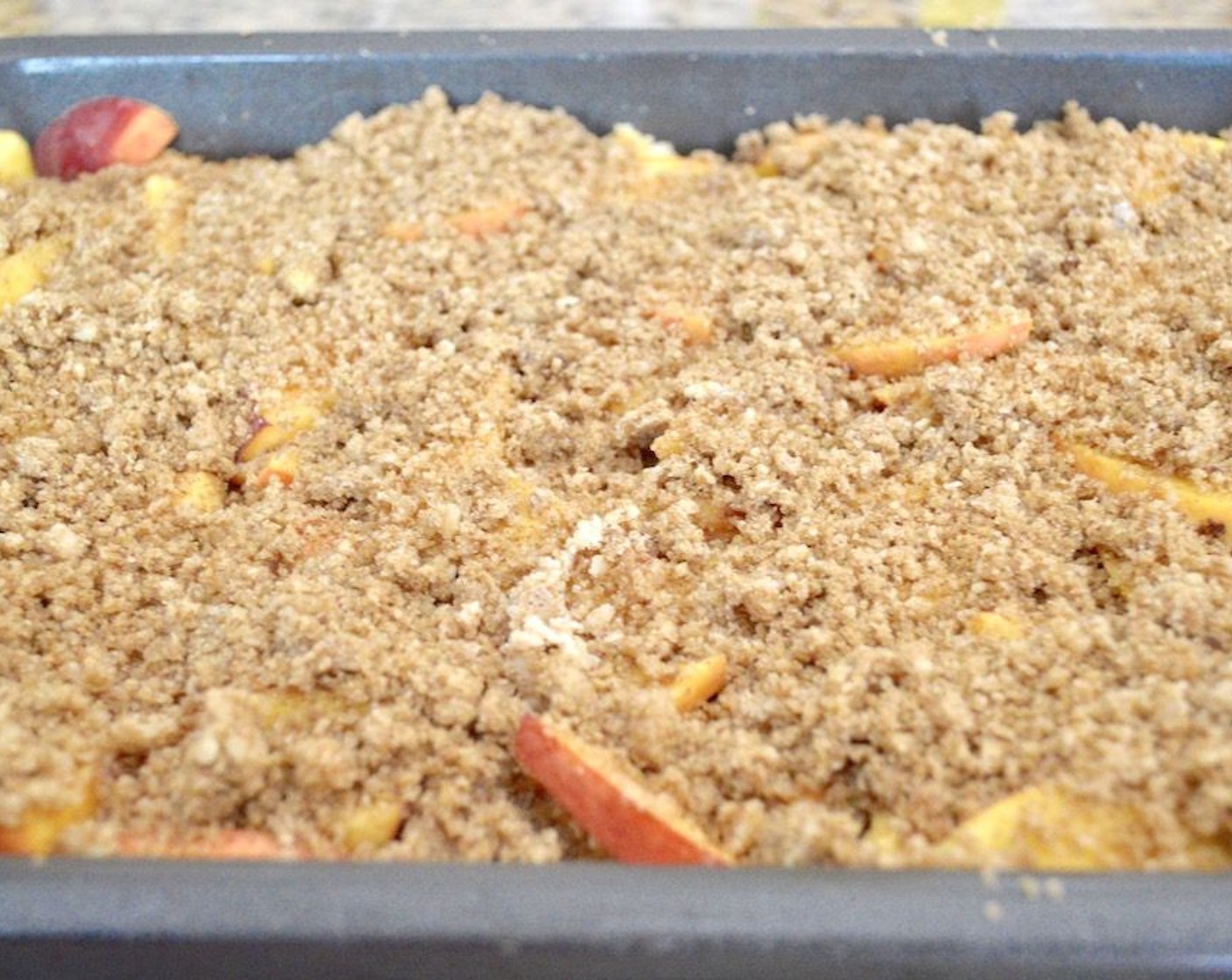 step 8 Sprinkle it all over the top of the casserole, then bake it for 45 minutes or so, until the custard is set and the crumb is golden.