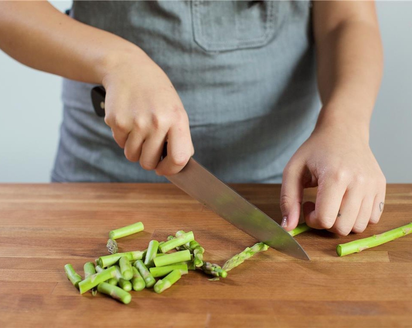 step 3 Trim Asparagus (3/4 cup) by snapping the thicker bottom ends where they break naturally. Cut the asparagus into one inch pieces, and set aside. Drain the Artichoke Hearts (2/3 cup) and set aside.