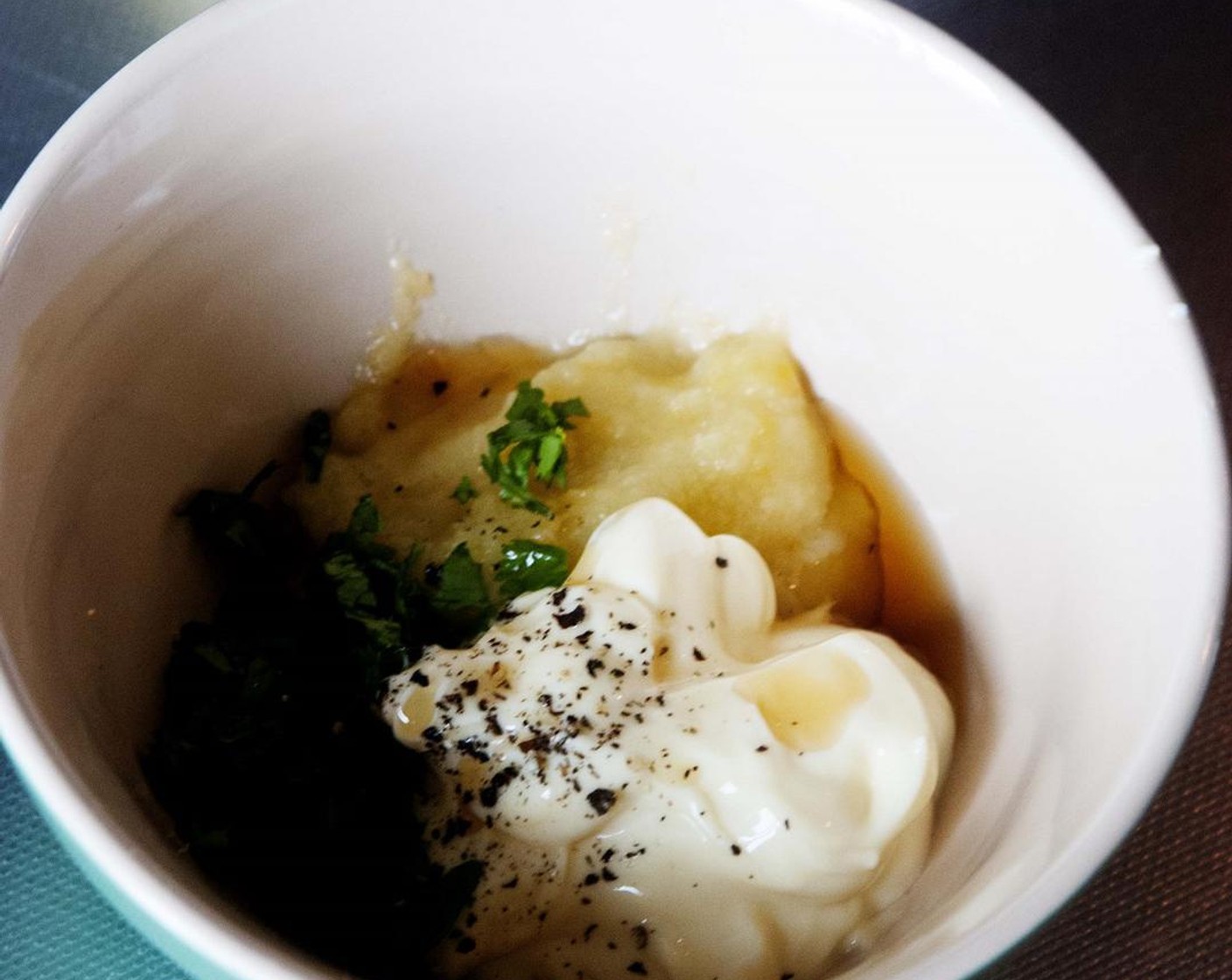 step 6 For the dipping sauce, in a bowl combine Coconut Jam (1/4 cup), Mayonnaise (1/2 cup), Sesame Oil (1/2 tsp), Soy Sauce (1 tsp), and Fresh Cilantro (1 tsp).