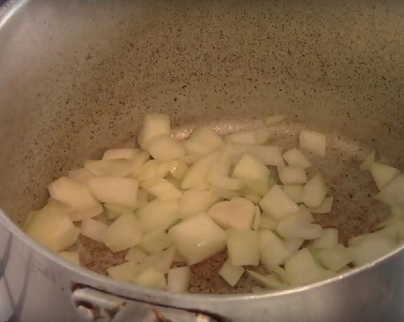 step 2 Put the chicken into a bowl and add Yellow Onion (1) to the pot. Fry them until they soften. Add Curry Powder (4 Tbsp) and stir it around. Return the chicken to the pot and stir in.