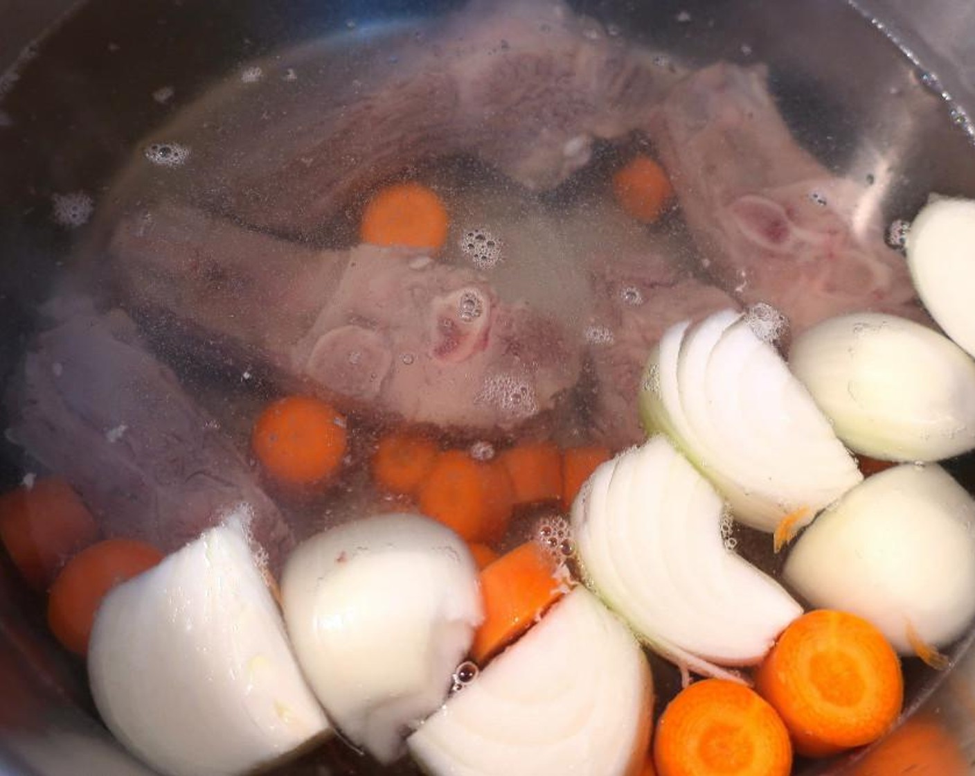 step 1 In a large pot, add the Beef Short Ribs (4 lb), Water (16 cups), Onion (1), Carrots (4), Kosher Salt (to taste), and Freshly Ground Black Pepper (to taste). Cook until ribs are soft but not falling apart.