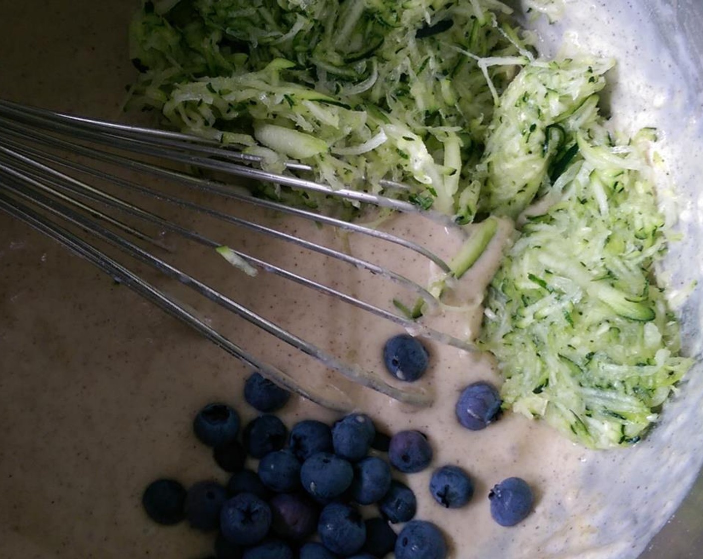 step 3 Melt Unsalted Butter (4 Tbsp). Add Milk (1 cup), Eggland's Best Classic Egg (1) and melted butter and mix until combined. Fold in zucchini and Fresh Blueberry (1 handful).