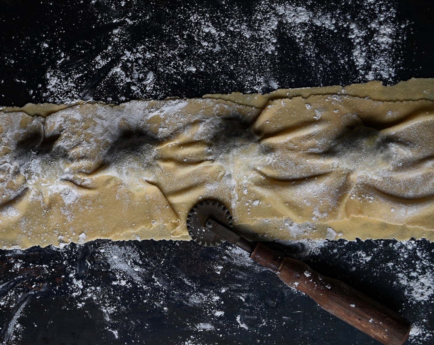 step 10 Roll out the remaining pasta and gently drape over the broccoli dollops, cupping your hand around each pocket to press out any air.