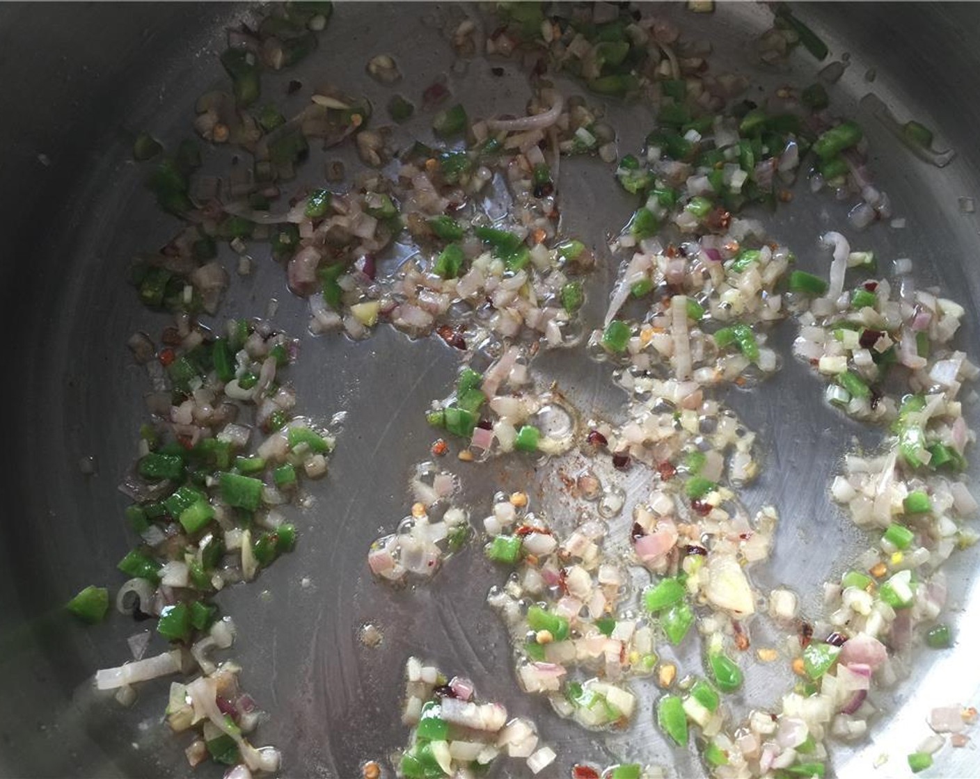step 10 Once the butter has melted, add in the shallots, jalapeno, garlic and Crushed Red Pepper Flakes (1 pinch).