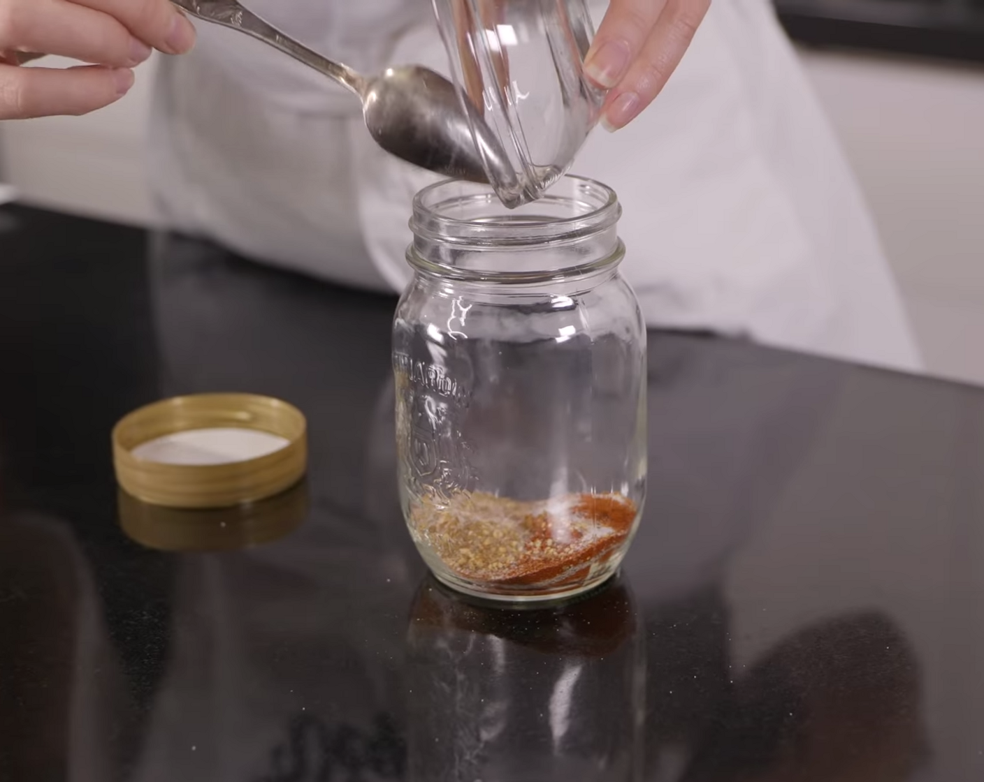 step 10 Meanwhile, make your dry rub. In a small jar, add Kosher Salt (1 tsp), Coarse Black Pepper (1 tsp), Smoked Paprika (1 tsp), Granulated Garlic (1 tsp), Ground Cumin (1/2 tsp), and shake to combine.
