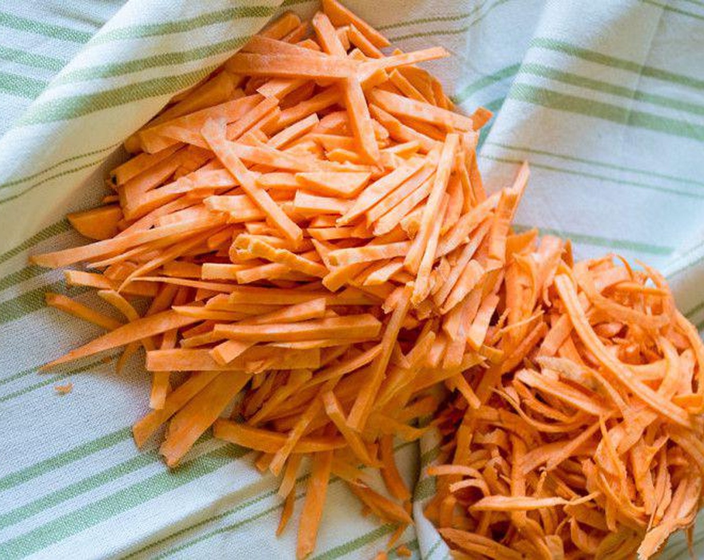 step 1 Spiralize Sweet Potatoes (2) or cut them into small matchstick pieces.