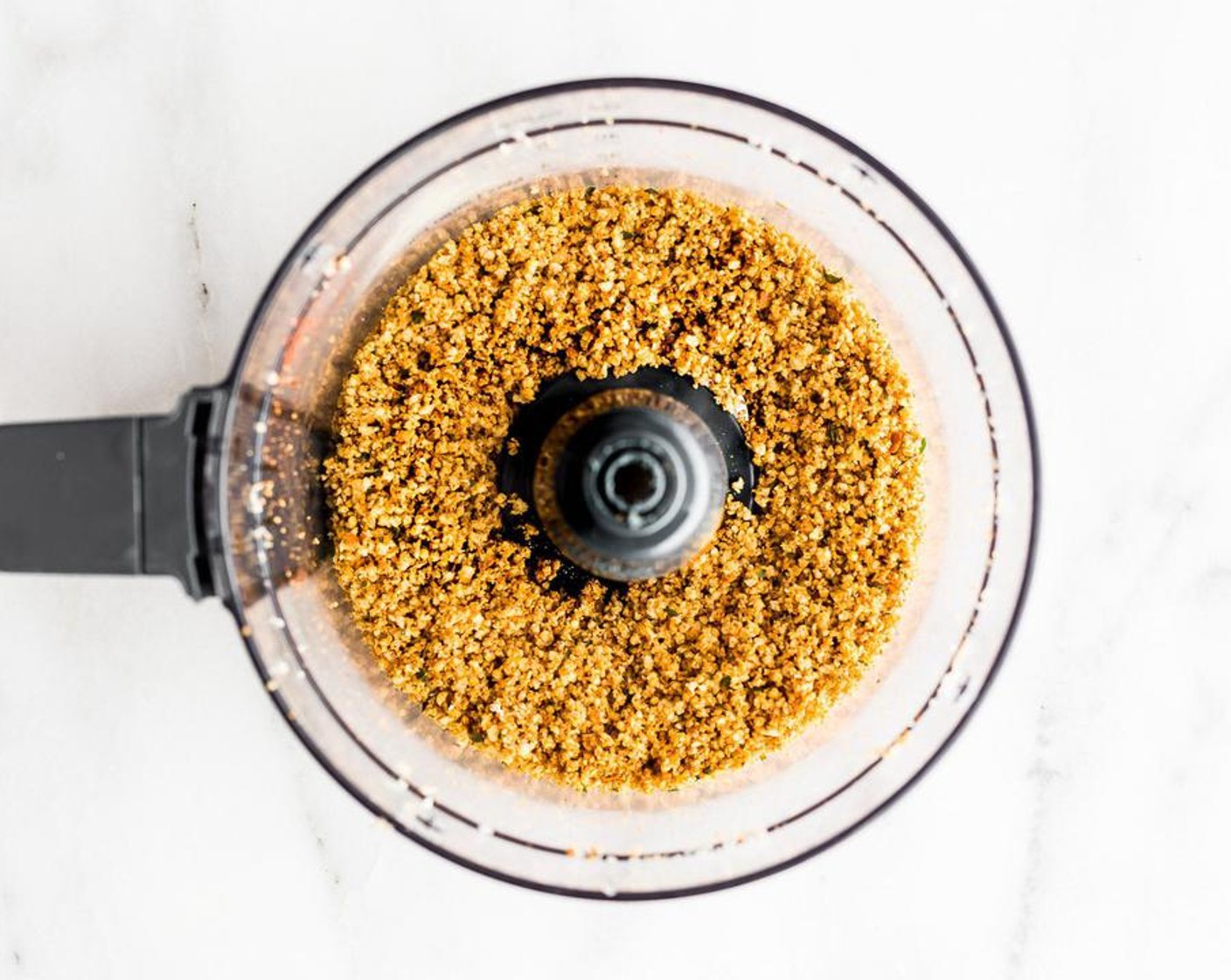 step 4 Add in your Garlic Powder (1/2 tsp), Smoked Paprika (1 tsp), Salt (to taste), Ground Black Pepper (to taste), leaves from Fresh Oregano (1 sprig), Fresh Ginger (1 pinch), and optional Ground Turmeric (1/4 tsp). Blend until a panko/meal crumb batter is formed.