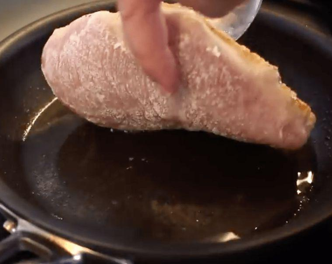 step 3 Heat Olive Oil (2 Tbsp) in a non-stick pan over medium heat. Sear chicken breasts on each side, until golden brown and cooked through.
