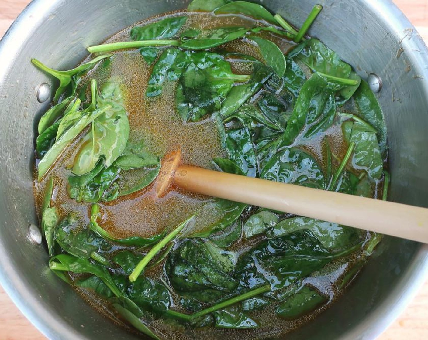 step 6 Add Spinach Leaves (7 1/2 cups) to the hot broth, stir, and let steep for 2 minutes.