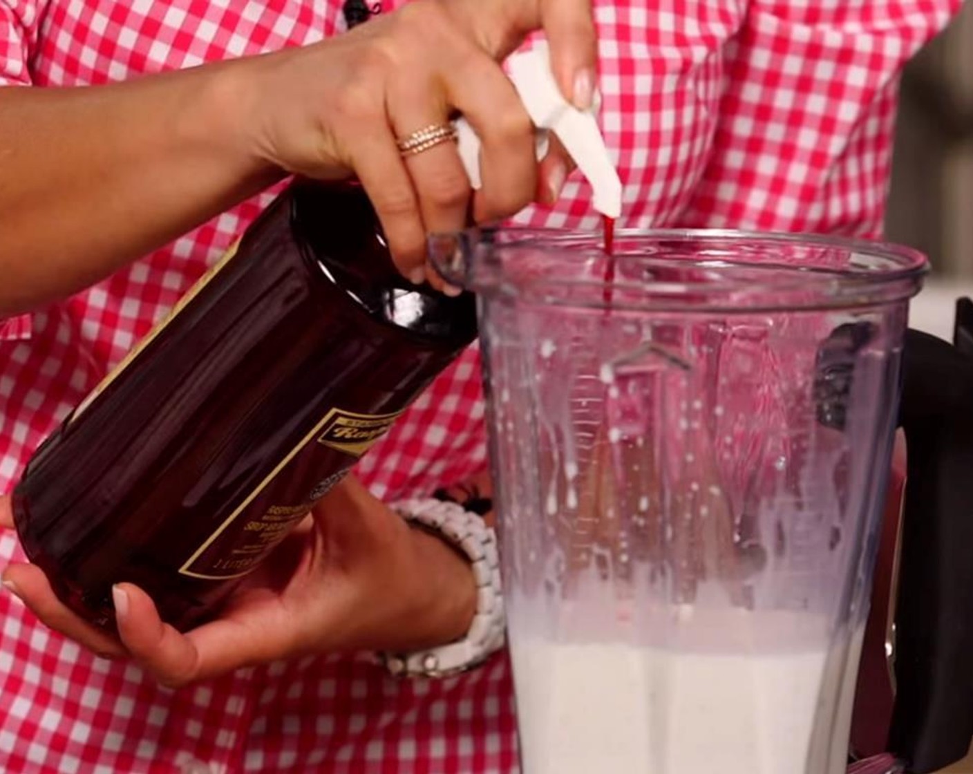 step 1 Add Ice (1/2 cup), Milk (3/4 cup), Vanilla Bean Ice Cream (1 scoop), Granulated Sugar (1/2 Tbsp), and Raspberry Syrup (2 drops) to a blender.