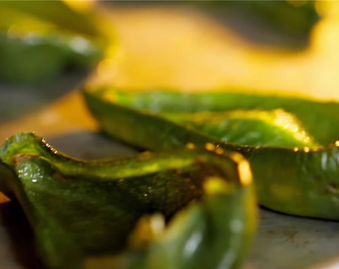 step 4 Arrange the chile halves, skin-side down, onto a baking sheet. Roast for 15 minutes or until the chiles are tender and the edges are lightly browned. Place the baking sheet of chiles onto a wire rack to cool.