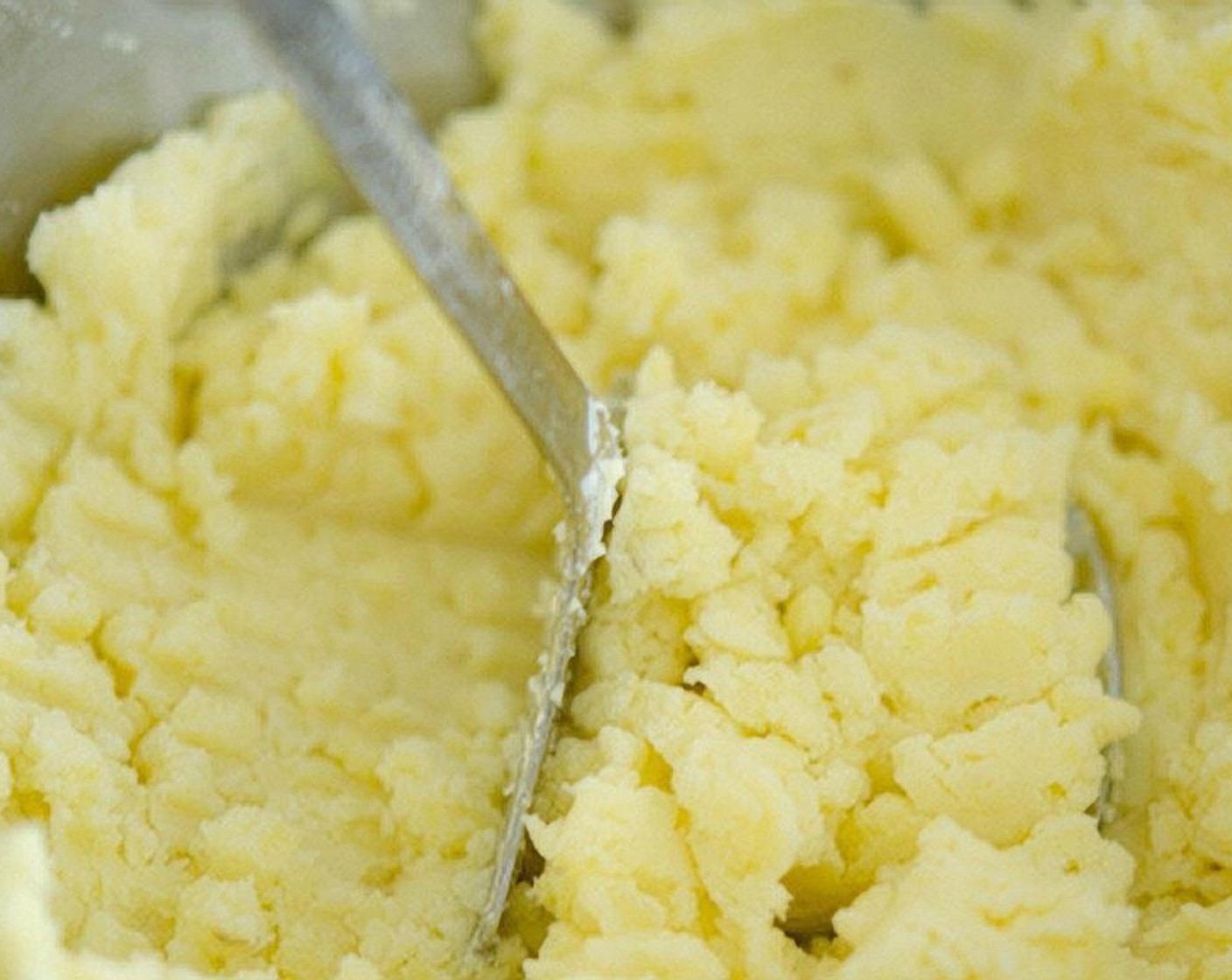 step 3 Mash potatoes in a large mixing bowl.