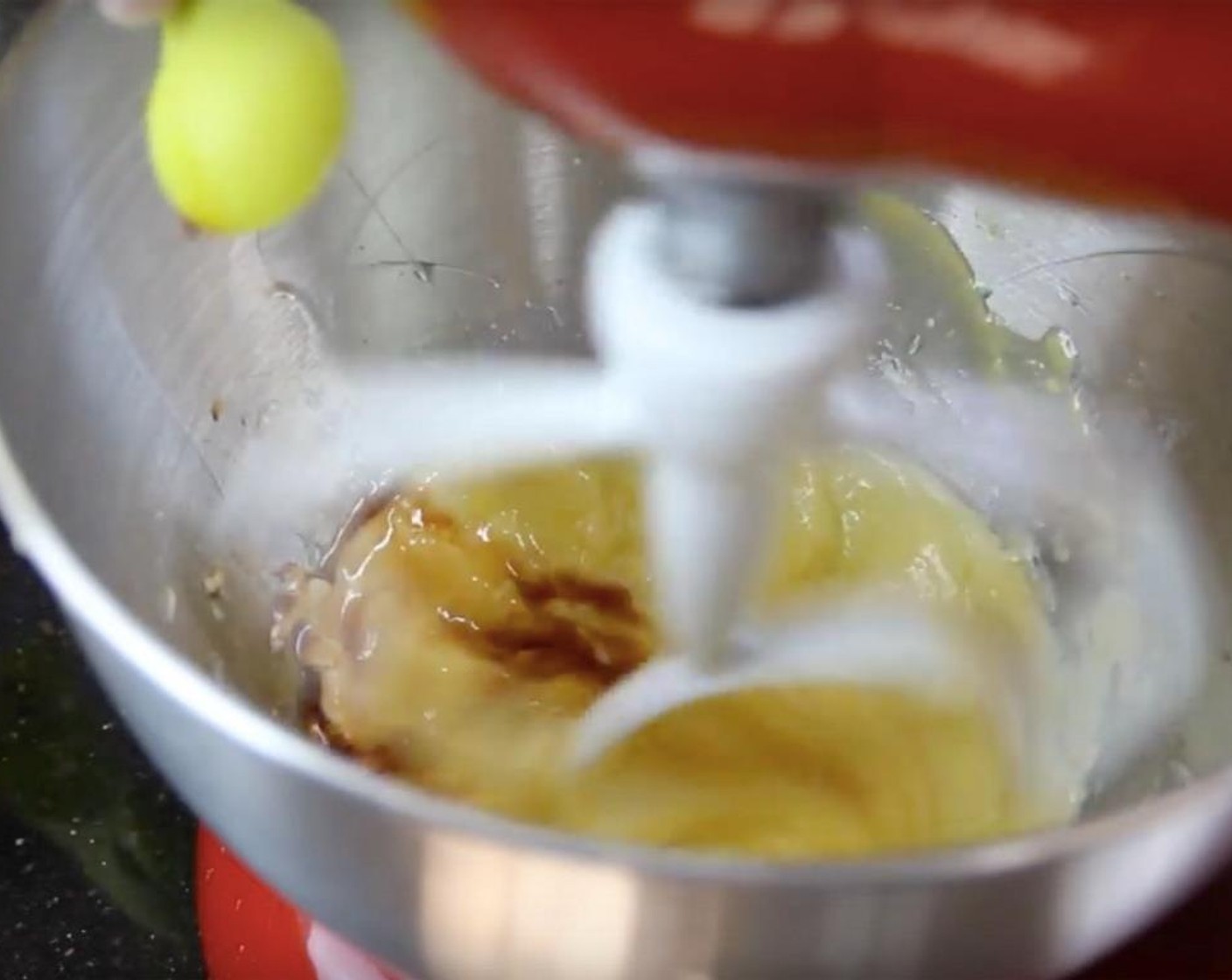 step 3 Mix in Egg (1) and Vanilla Extract (1/2 tsp).