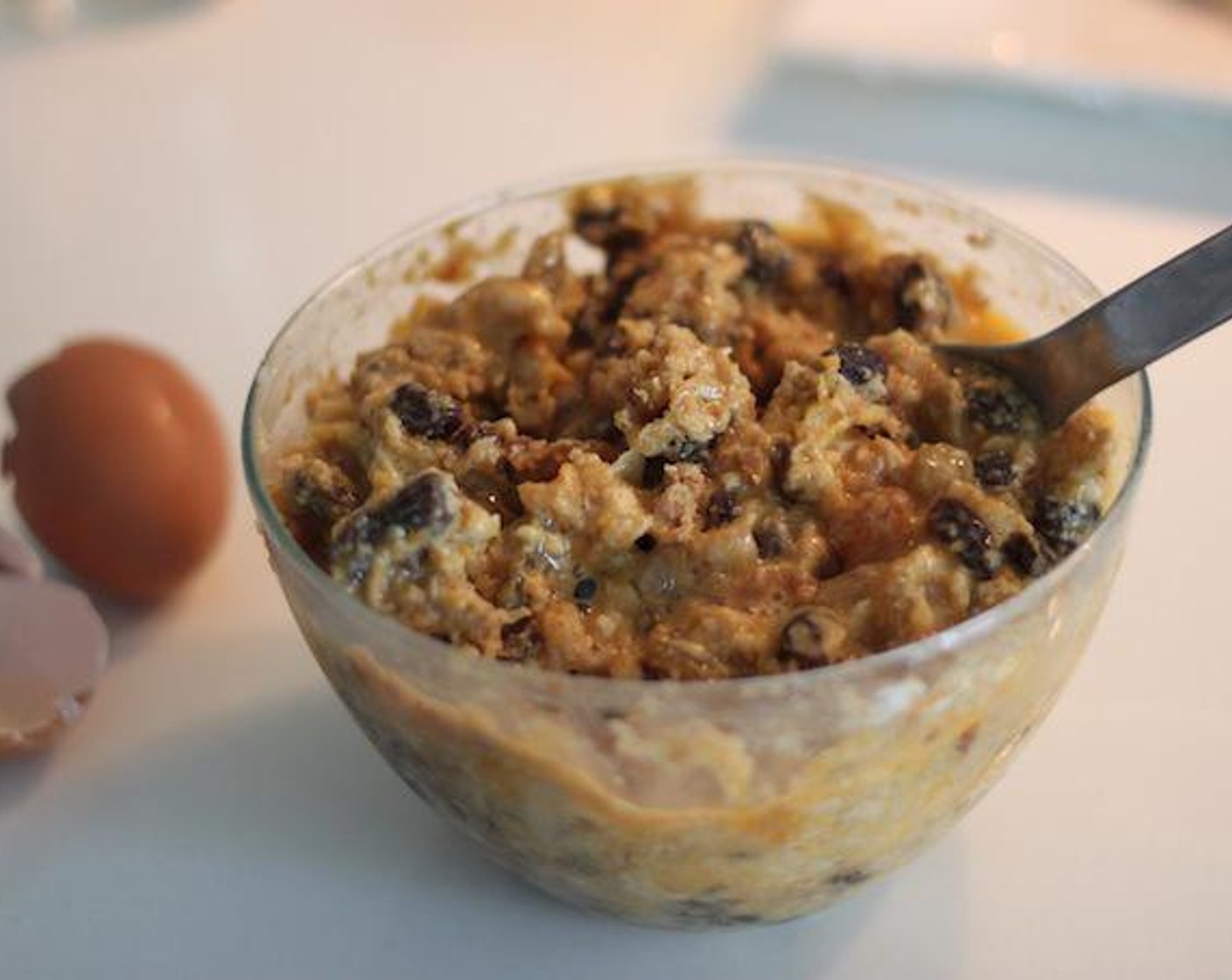 step 11 Beat an Egg (1) and put it in your Christmas Pudding bowl.  The mixture should have a fairly soft consistency.