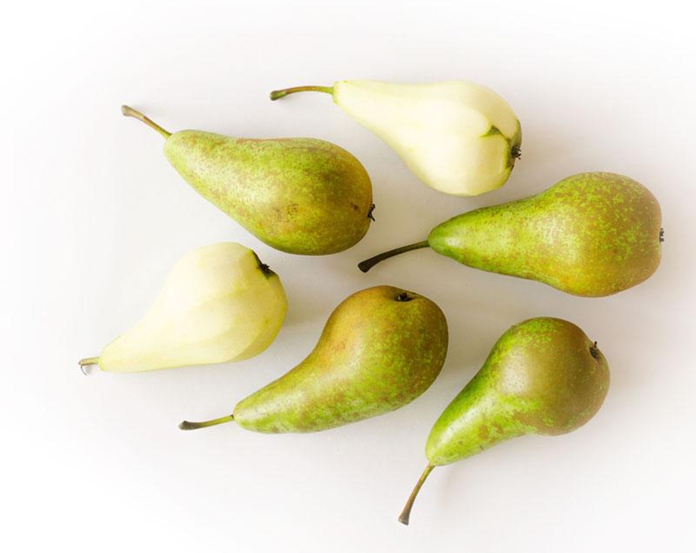 step 1 Cut a small portion of the bottom of each Pears (6) off so they can sit upright. Peel the skin from each, then set aside.