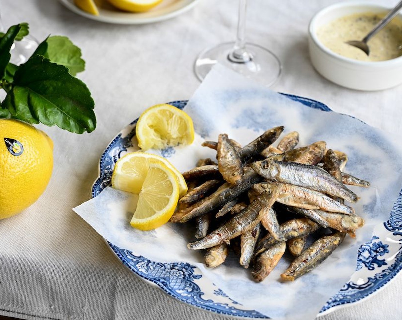 step 8 Season with Sea Salt (to taste) and serve the whitebait immediately with the mayonnaise and Slices of Lemons (2) for squeezing over the fish.