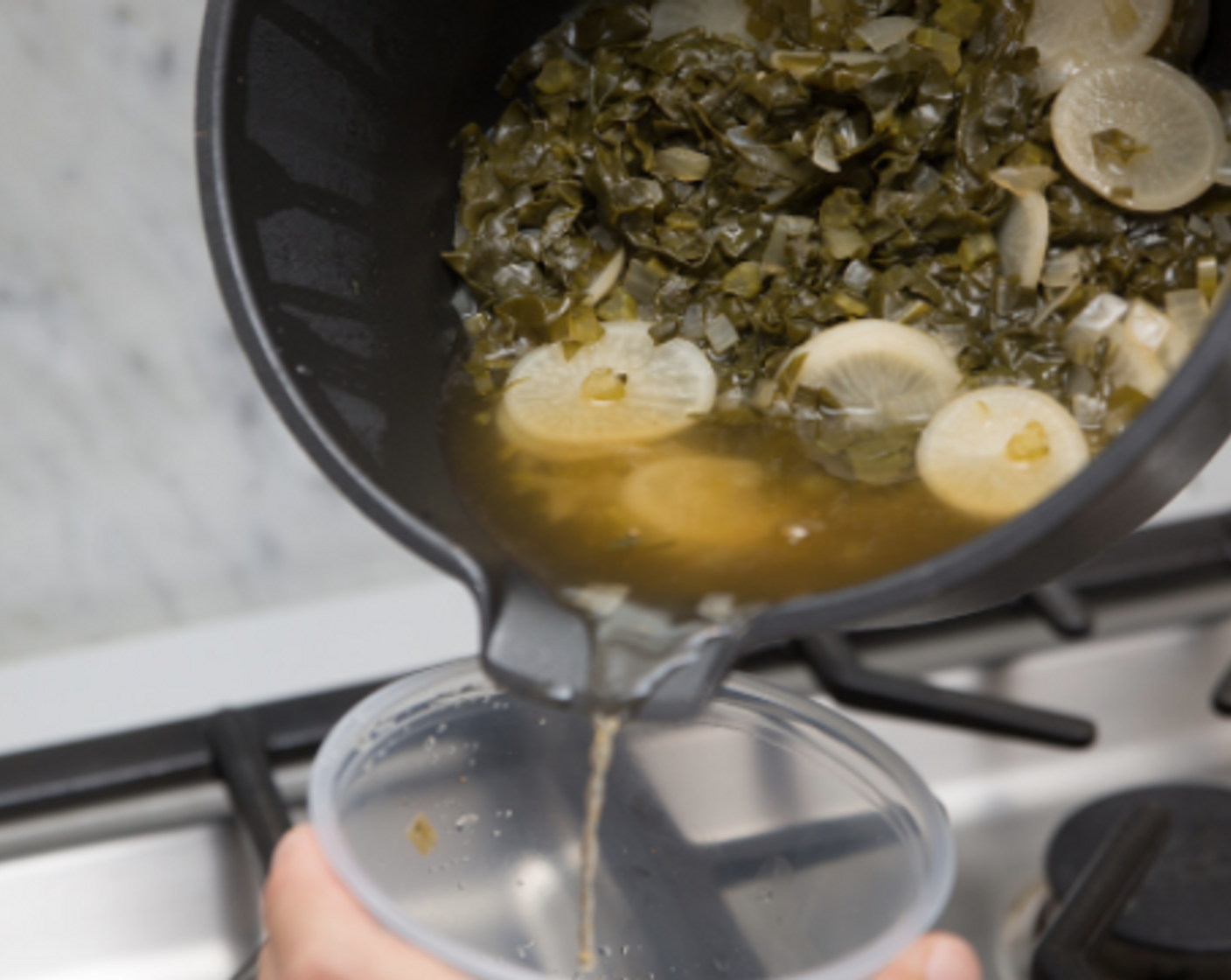 step 5 Add collard greens leaves and Water (2 cups). Stir in Pepper Jelly (1 Tbsp) and Salt (1/4 tsp). Bring to a boil, then reduce heat to achieve a slow and steady simmer. Cover and cook 25-35 minutes, or until greens and turnips are tender.