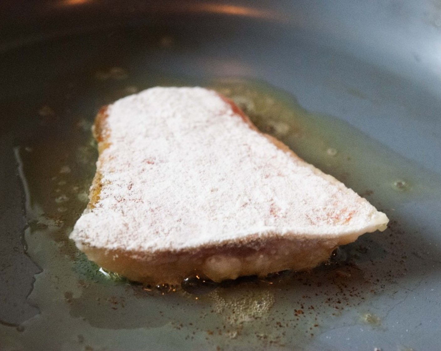 step 8 In a skillet heat remaining Olive Oil (1 Tbsp) and Unsalted Butter (1 Tbsp), then seared the fish fillet, cooking it for about 4-5 mins on both sides. Just about 1 min from removing the fish from the pan, squeeze the juice of half a lemon.