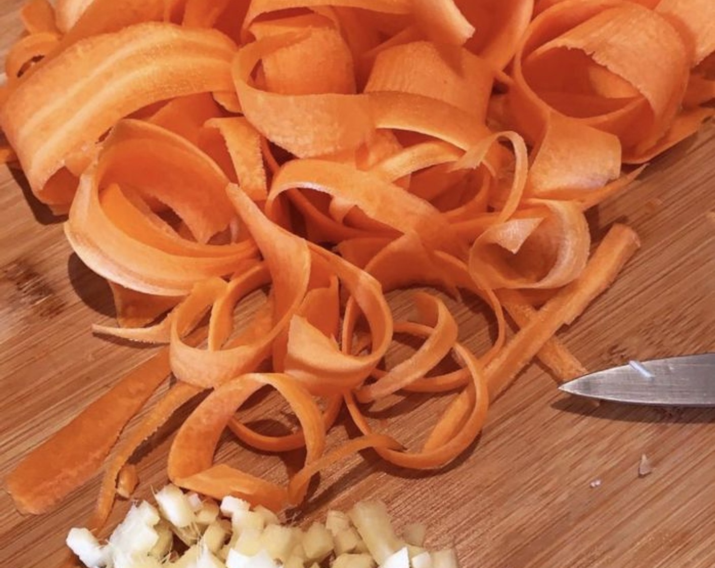 step 2 Peel the Carrots (3 1/3 cups) and Fresh Ginger (1 in), then dice the ginger and slice the carrots. I like to slice them very thin, but honestly speaking, any shape you like will work.