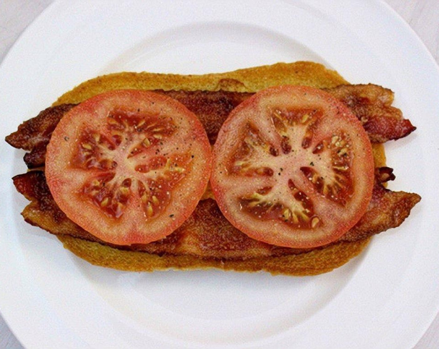 step 10 Top with 2 slices of tomatoes and avocados.