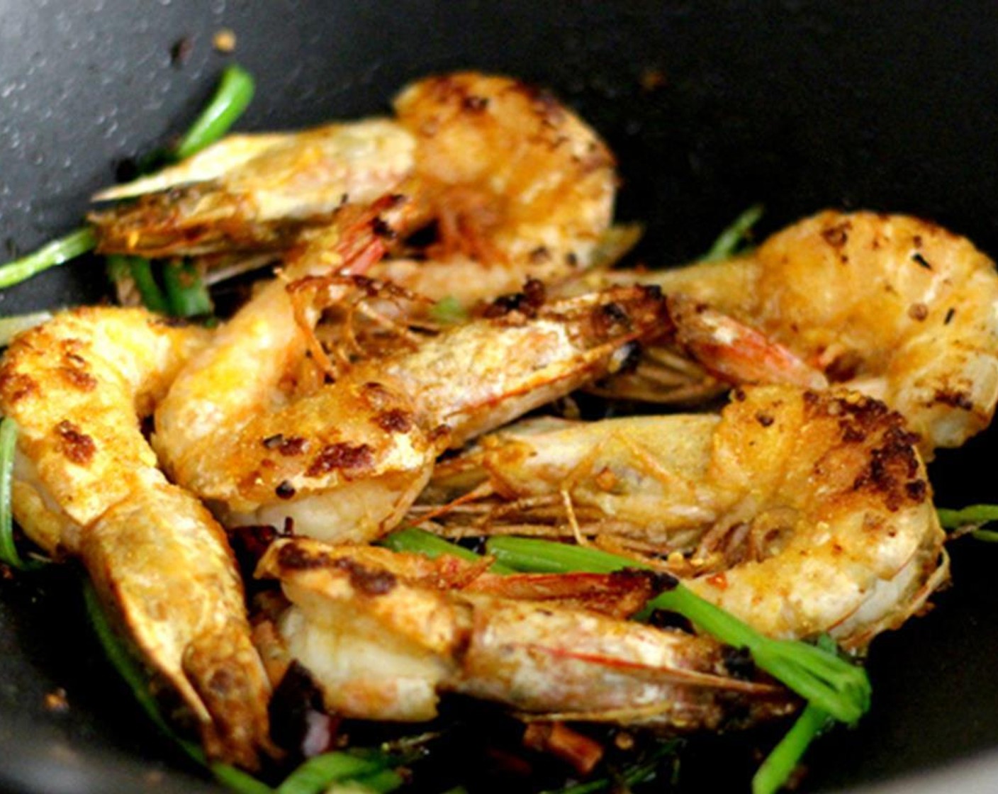 step 10 Turn them over and fry the other sides. It’s important not to stir them or move them around too much, otherwise they won’t fry properly. Once both sides are crispy, add the Scallion (1 bunch), Asian Celery (1 stalk), and 1/2 tsp of the Fish Sauce (1 tsp).