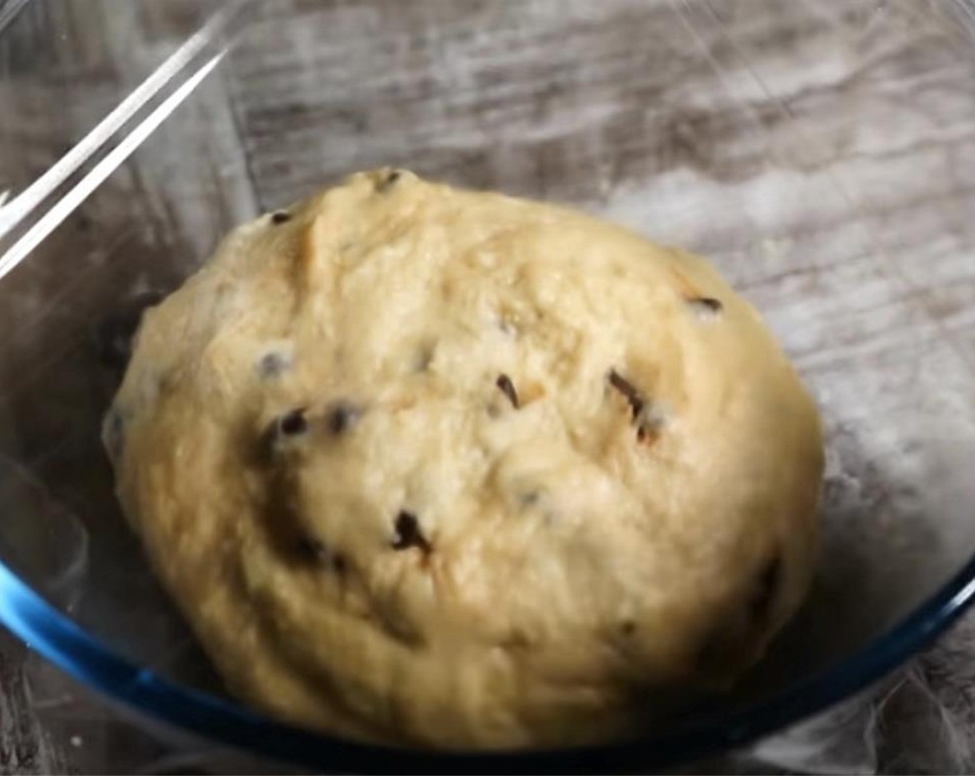 step 10 Once you are happy with the consistency of the dough for your Italian Hot Cross Buns, place it into a bowl and seal it tightly with cling film. Leave it to rise overnight to ensure a really moist result.