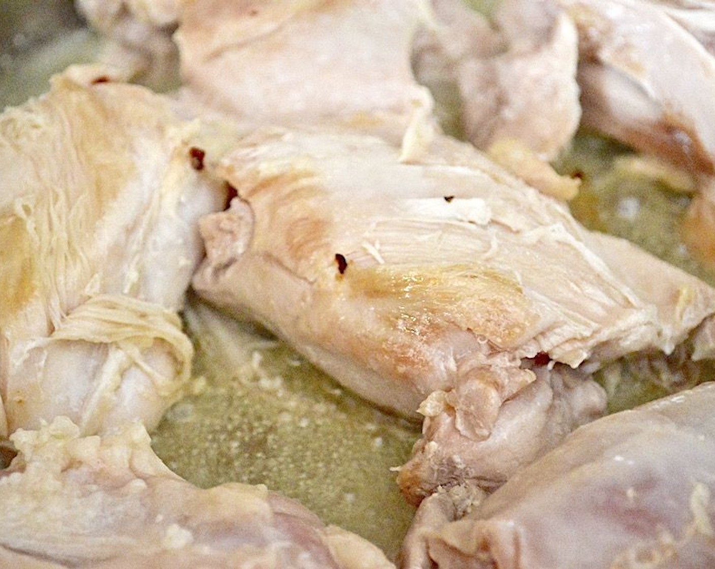 step 3 Season the Boneless, Skinless Chicken Thighs (6) with Salt (1 pinch) and Crushed Red Pepper Flakes (1 pinch). Brown them in the pan for about 4 minutes on each side to develop some color. Transfer them to a plate.