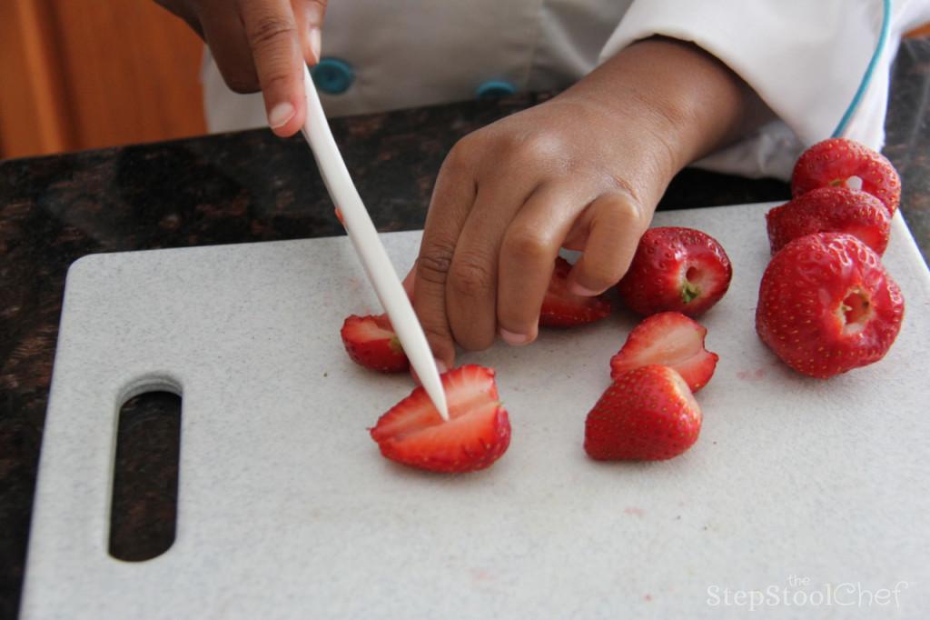 Step 2 of Berrylicious French Toast Casserole Recipe: Chop the Fresh Strawberry (1/2 cup).