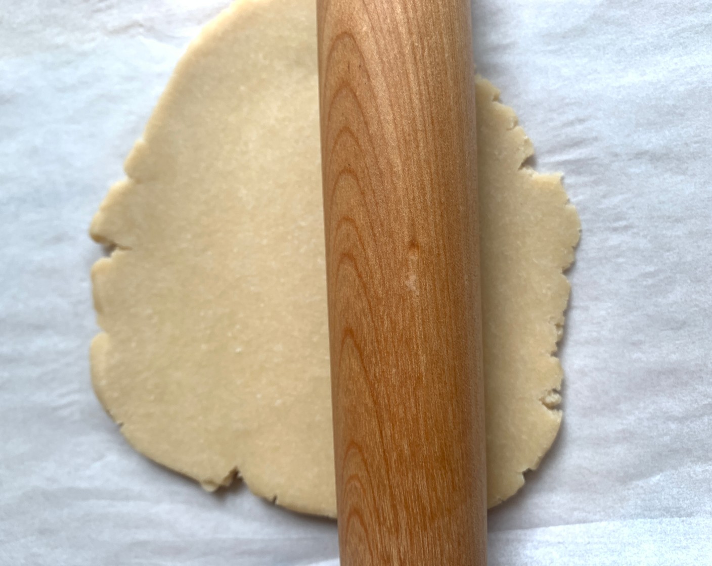 step 5 Roll the dough out onto a lightly floured surface to 1⁄8” thickness.