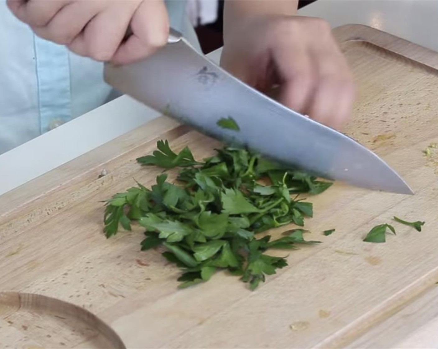 step 7 Roughly chop the Fresh Parsley (1/4 cup) and add to the blender.