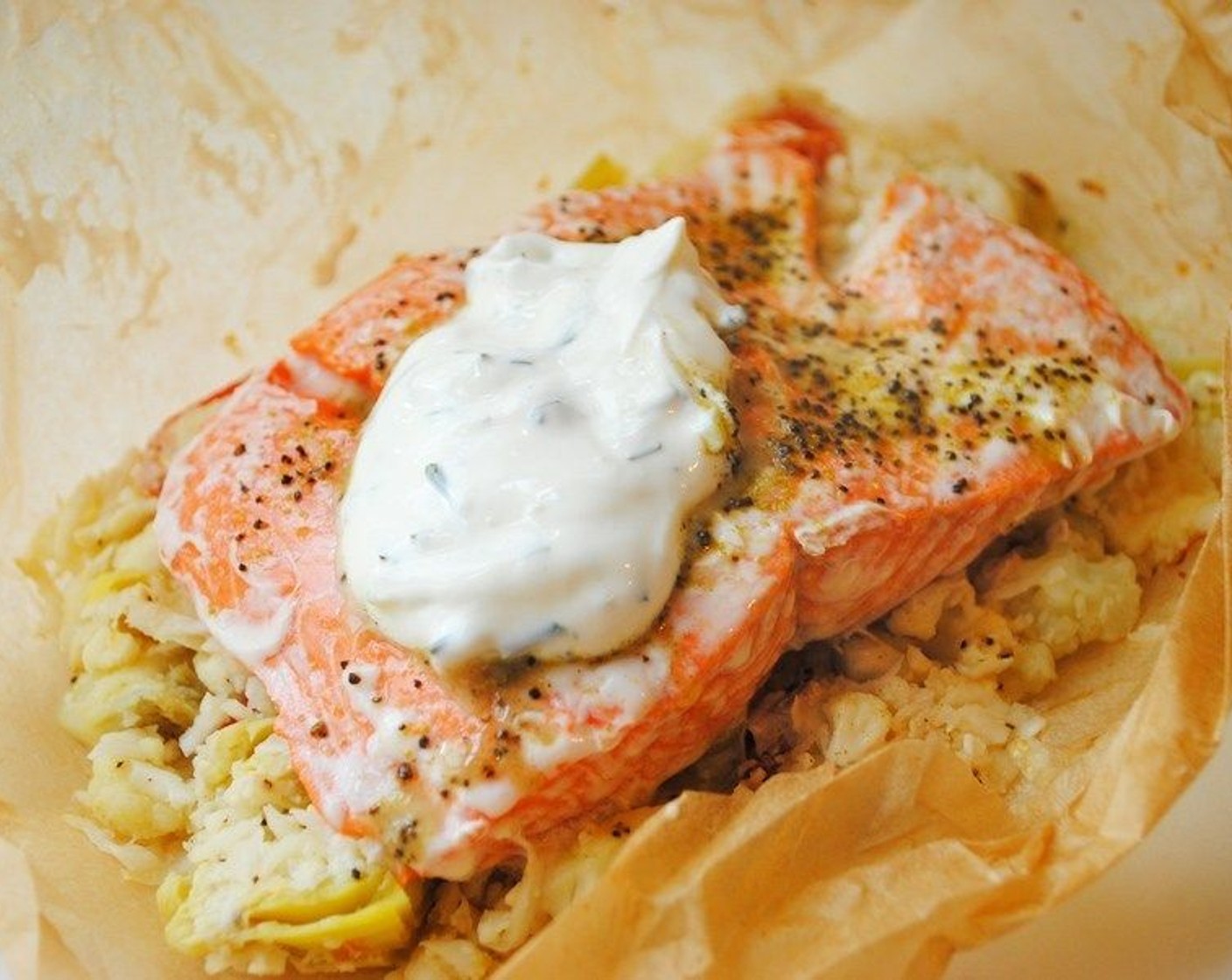 step 7 Serve each parchment on a plate and allow guests to open their own packet. I like to serve mine with a dollop of Tzatziki (to taste), or you can use Salt (to taste) and Ground Black Pepper (to taste). Enjoy!