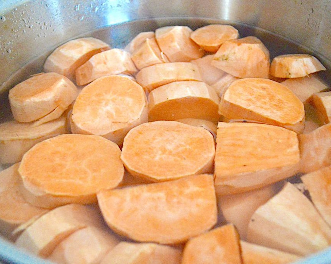 step 1 Transfer Sweet Potatoes (10) to a large pot and submerge them in cold water. Bring the pot to a boil and boil the sweet potatoes until they are fork tender for about 15 minutes or so. Drain them and dump them into a large mixing bowl.