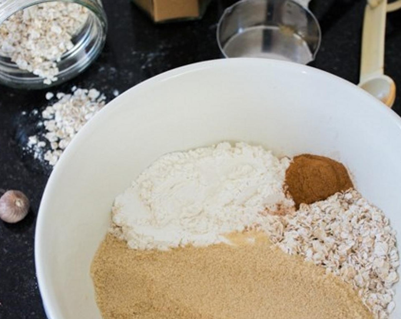 step 2 Then get the crisp topping mixture ready. Combine All-Purpose Flour (4 Tbsp), Oats (1/2 cup), Brown Sugar (1/2 cup), Simply Organic Cinnamon, Ground (1/2 tsp), and Ground Nutmeg (1 pinch) in a mixing bowl.