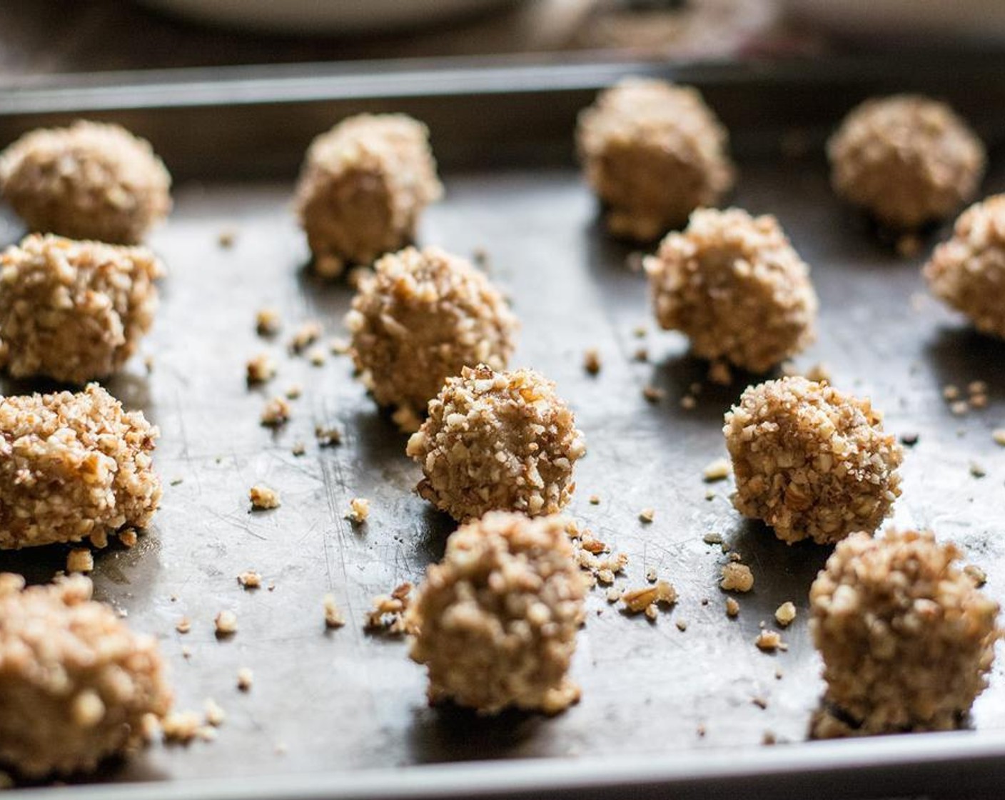 step 3 Roll dough into small balls, then wet in slightly beaten egg whites and then again in the Pecans (2 cups).