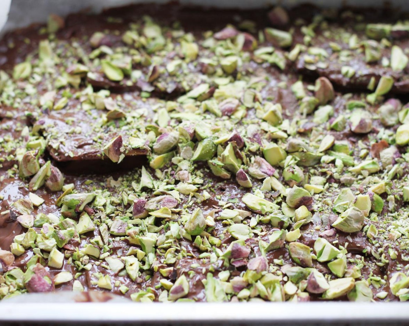 step 10 Evenly sprinkle over chopped pistachios. Place in the refrigerator to set, about 20 minutes.