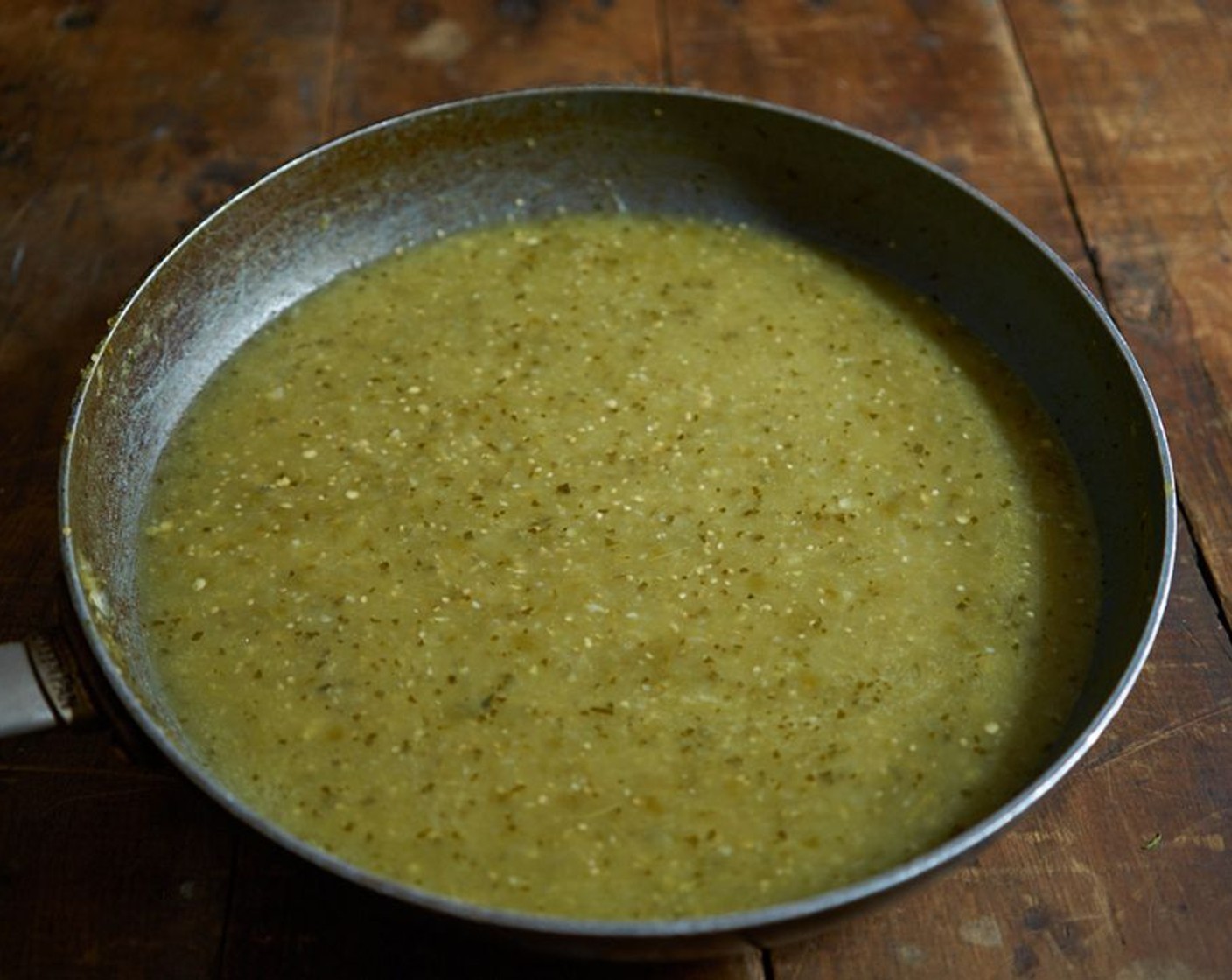 step 3 Heat the Vegetable Oil (1 tsp) in a large skillet over medium-high heat. When it’s hot enough to make a drop of the salsa mixture sizzle, add all of it to the pan at once and stir frequently for about 4 – 5 minutes until the sauce thickens and darkens.