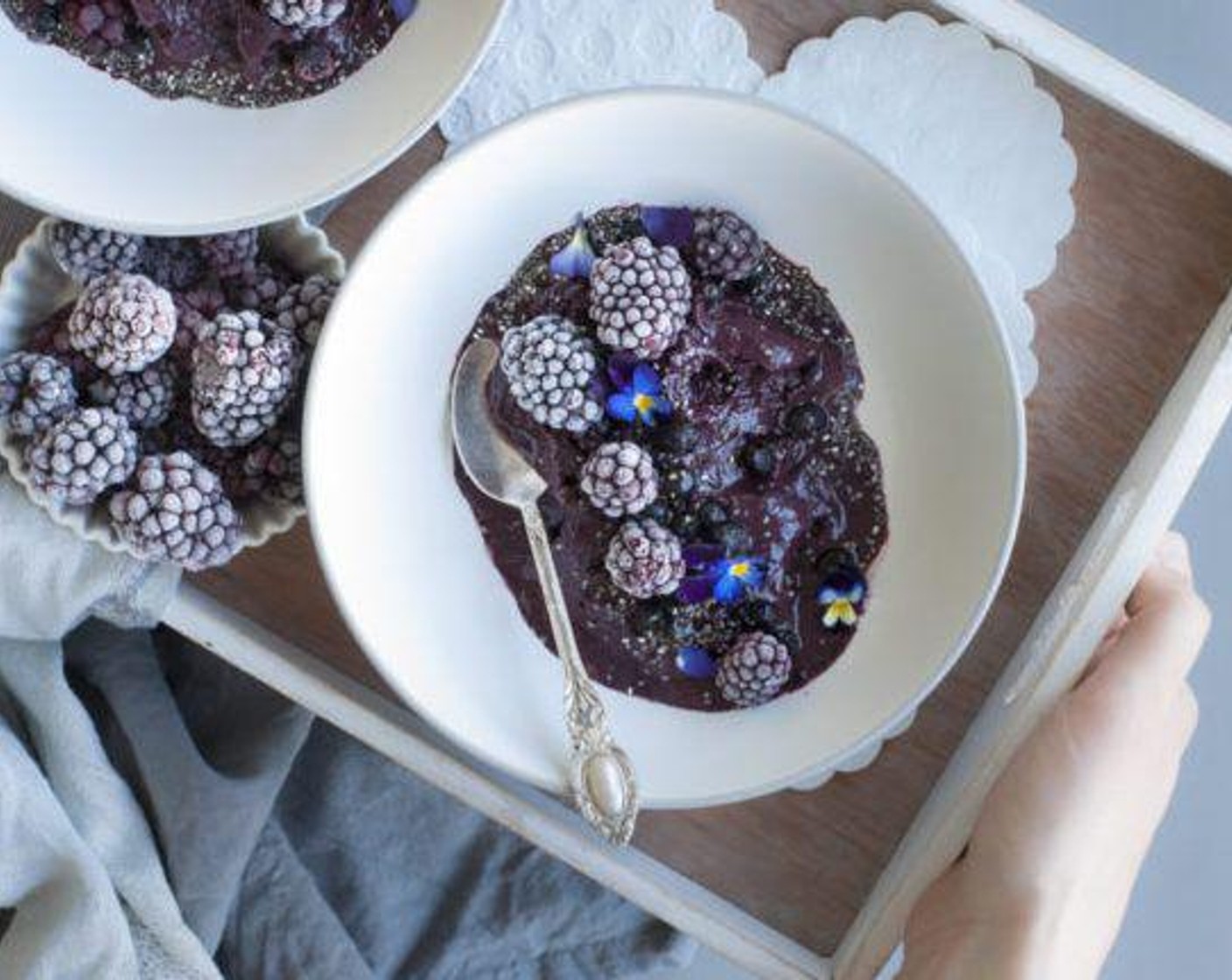 step 2 Serve with Fresh Blackberries (to taste), Fresh Blueberries (to taste), Chia Seeds (to taste), and Edible Flowers (to taste).