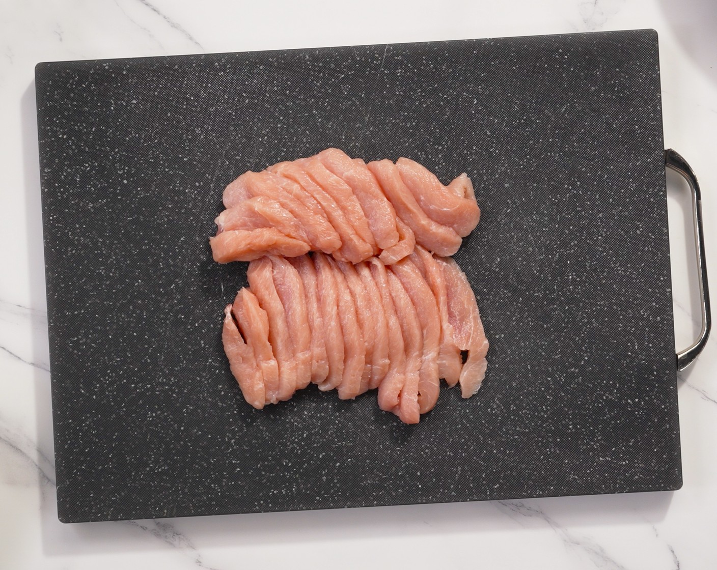 step 1 Slice the Pork Loin (1 lb) into ¼-inch slices.
